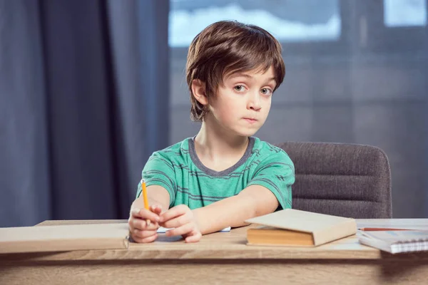 Boy doing homework — Stock Photo