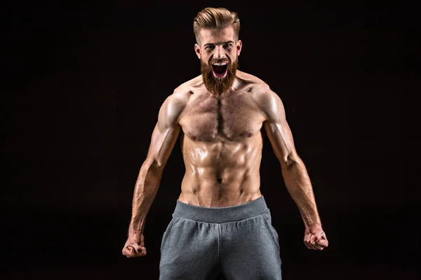 Shirtless bodybuilder posing — Stock Photo