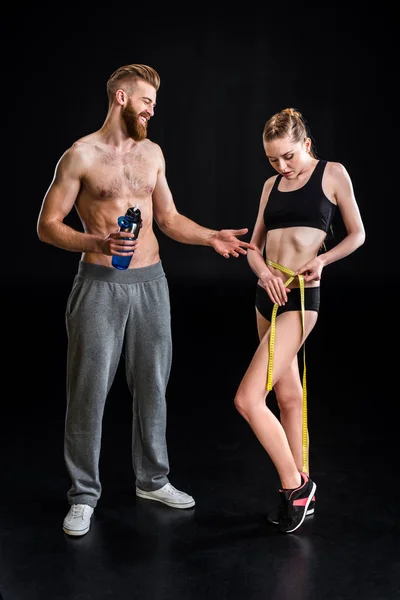 Bearded sportsman and sportswoman — Stock Photo