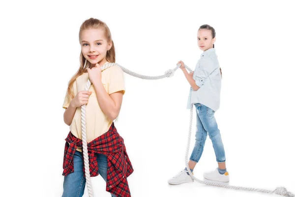 Girls play tug of war — Stock Photo