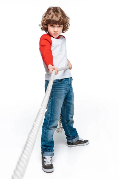 Cute boy play tug of war — Stock Photo
