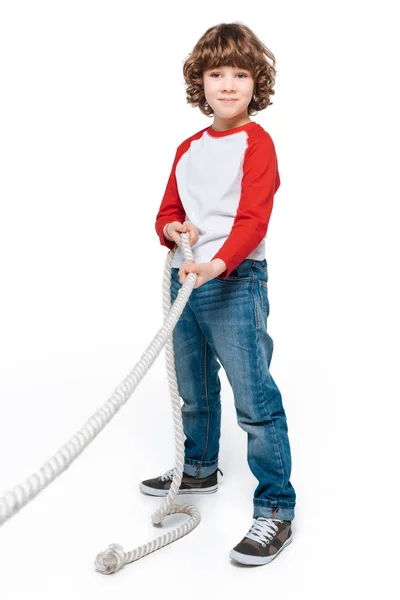 Cute boy play tug of war — Stock Photo