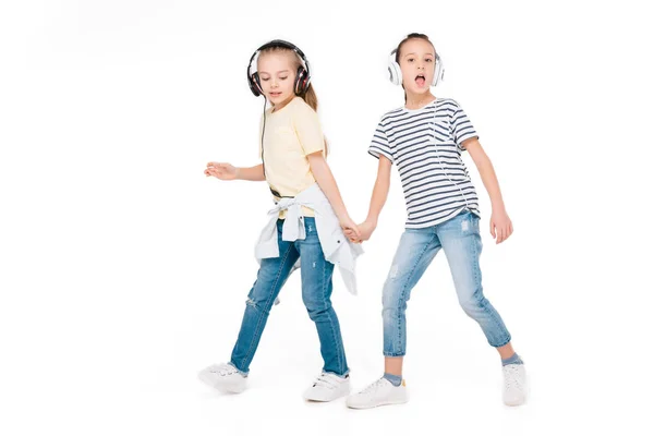 Kids in headphone listening music — Stock Photo