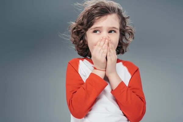Curly little boy at studio — Stock Photo