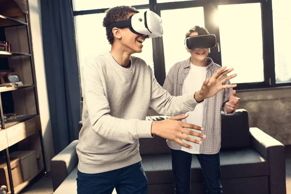 Boys in virtual reality headsets — Stock Photo