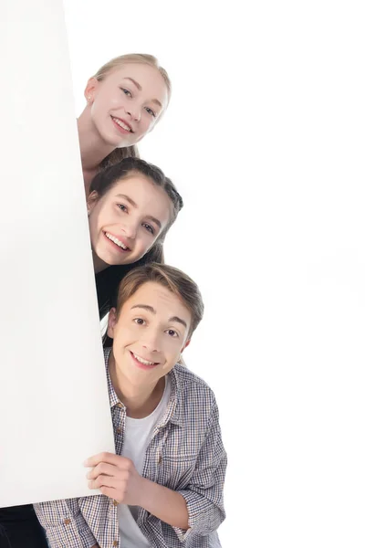 Teenagers with big banner — Stock Photo