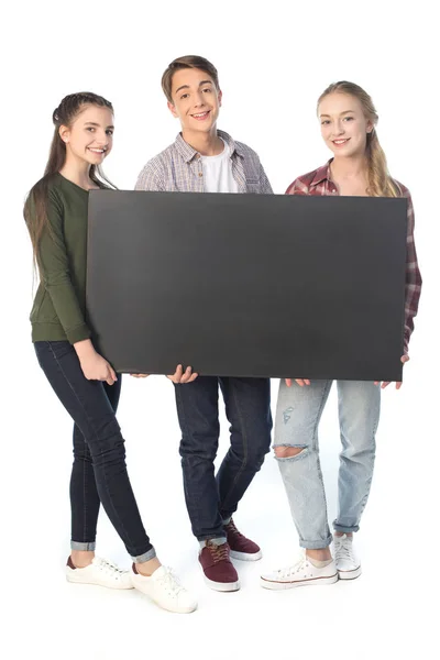 Подростки с большим баннером — стоковое фото