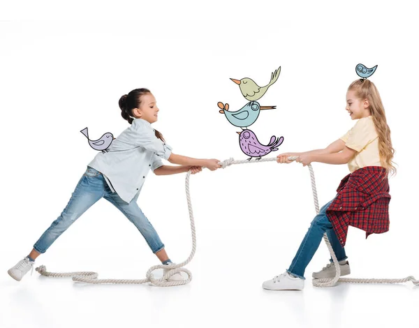 Girls pulling up rope — Stock Photo