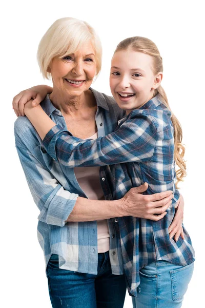 Grandmother and granddaughter hugging — Stock Photo