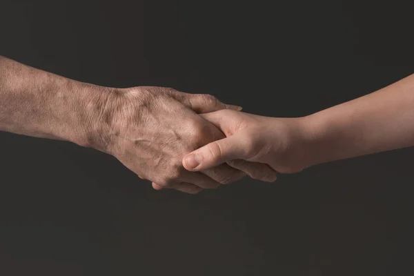 People holding hands — Stock Photo