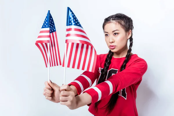 Fille avec des drapeaux américains — Photo de stock