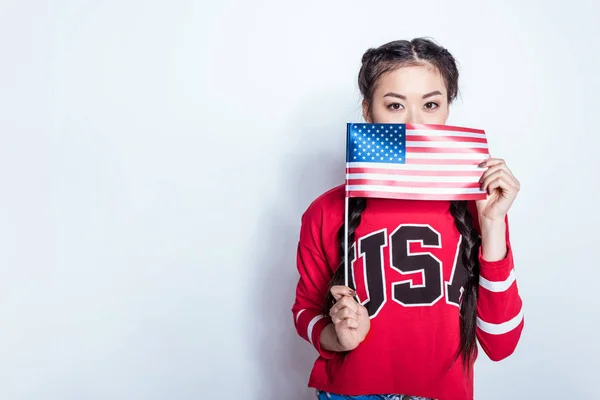 Girl with american flag — Stock Photo