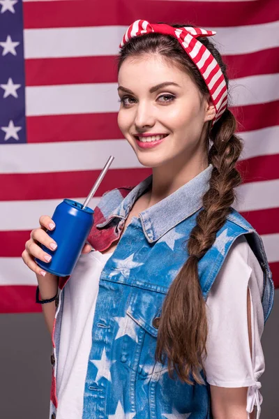 Woman holding drink — Stock Photo