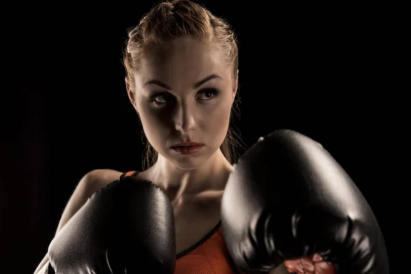 Sportswoman in boxing gloves — Stock Photo