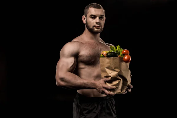 Hombre sin camisa con comida saludable - foto de stock