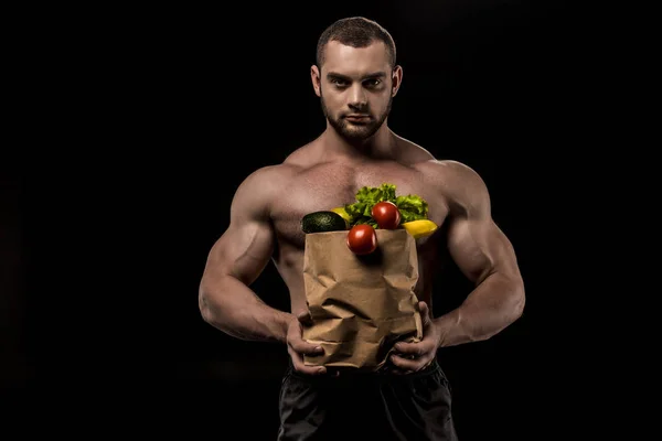 Hombre sin camisa con comida saludable - foto de stock
