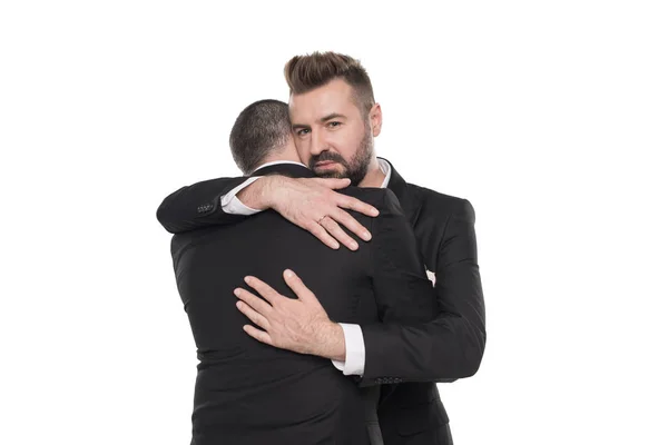 Homosexual couple of grooms in suits — Stock Photo