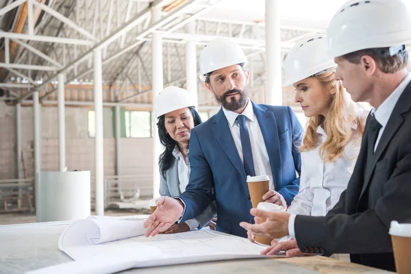 Group of contractors in formal wear — Stock Photo