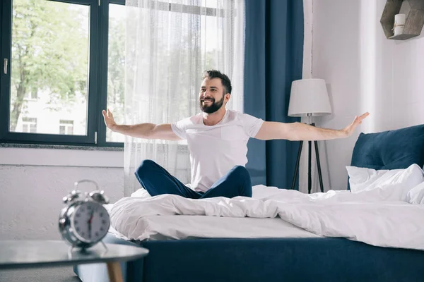 Young man waking up — Stock Photo