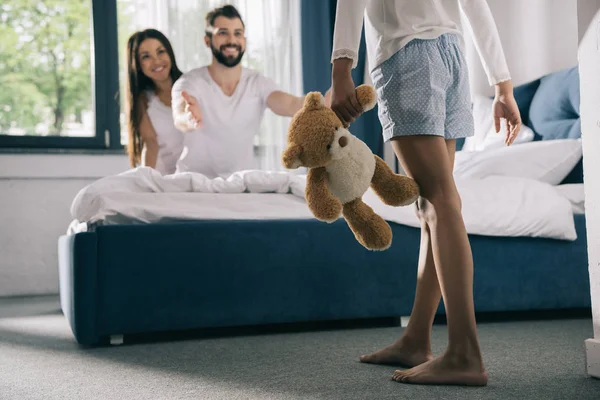 Happy family in bedroom — Stock Photo