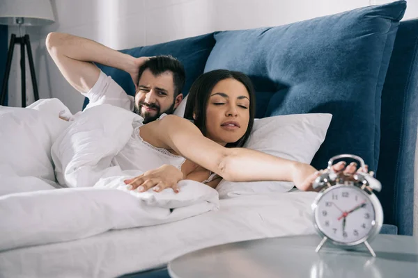 Young couple sleeping in bed — Stock Photo