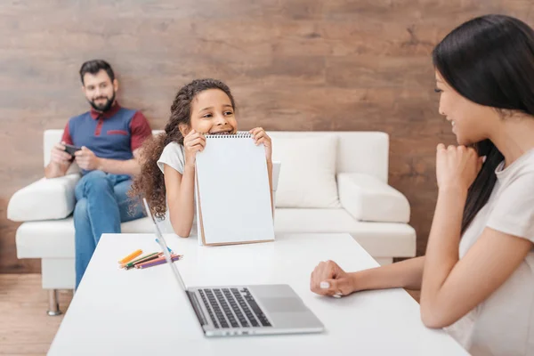 Girl with drawing album — Stock Photo