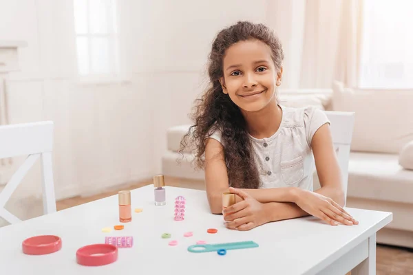 Girl doing manicure — Stock Photo