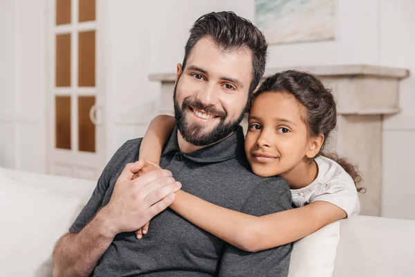 Multiethnic family at home — Stock Photo