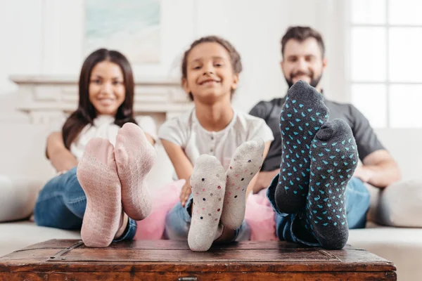 Family feet in socks — Stock Photo