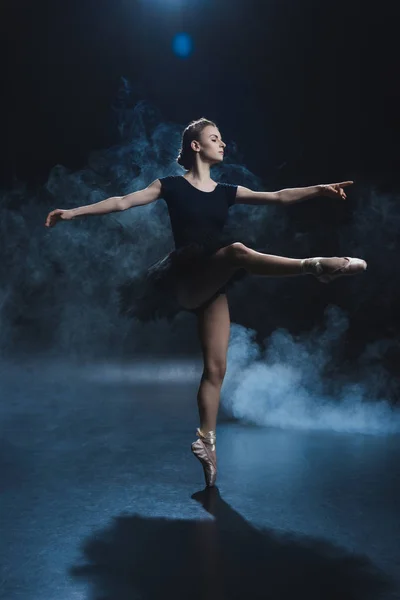 Ballerina in black tutu — Stock Photo