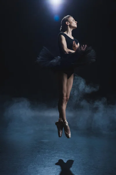 Ballerina dancing in pointe shoes — Stock Photo