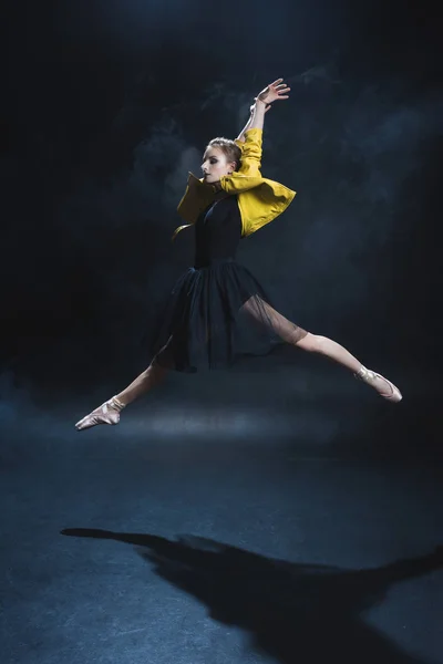 Ballerina in tutu and leather jacket — Stock Photo