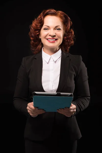 Businesswoman holding digital tablet — Stock Photo