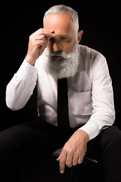 Hombre frotando nariz puente - foto de stock