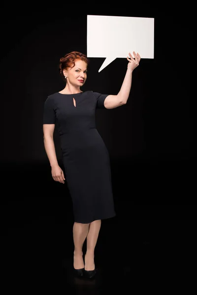 Woman holding speech bubble — Stock Photo