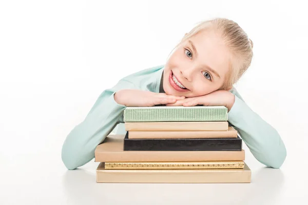 Feliz colegiala con libros - foto de stock