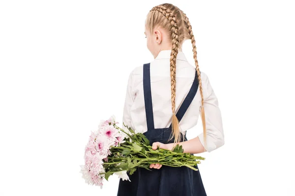 Child holding bouquet of flowers — Stock Photo