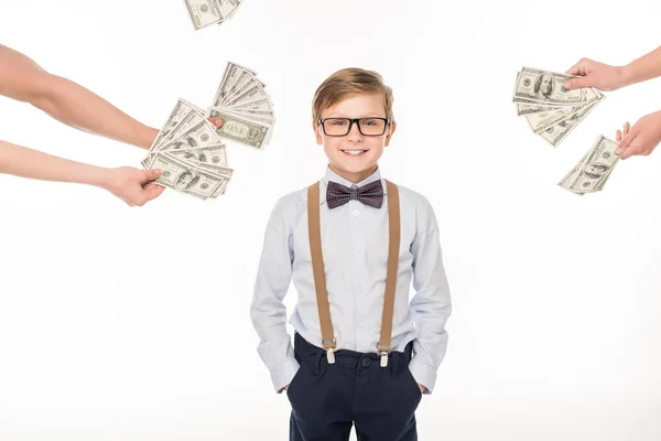 Little boy with dollar banknotes — Stock Photo