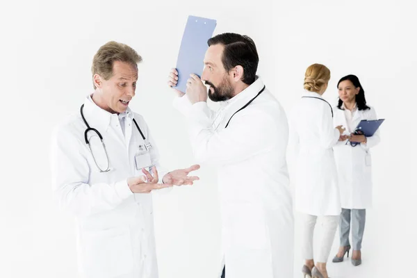 Emotional male doctors — Stock Photo