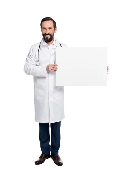 Médico segurando banner em branco — Fotografia de Stock