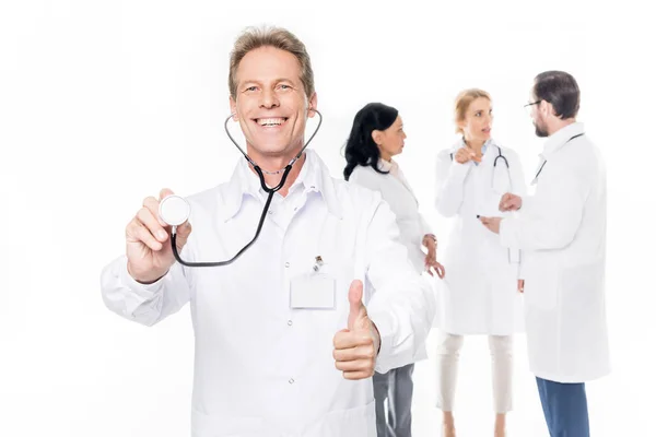 Cheerful middle aged doctor — Stock Photo