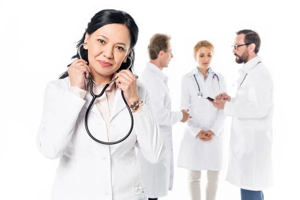 Asian doctor with stethoscope — Stock Photo