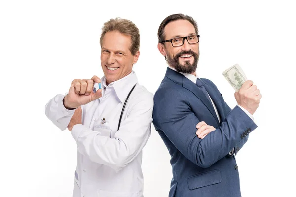 Businessman buying drug from doctor — Stock Photo