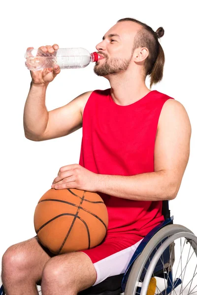 Disabled sportsman drinking water — Stock Photo