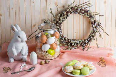 Easter eggs and macarons clipart