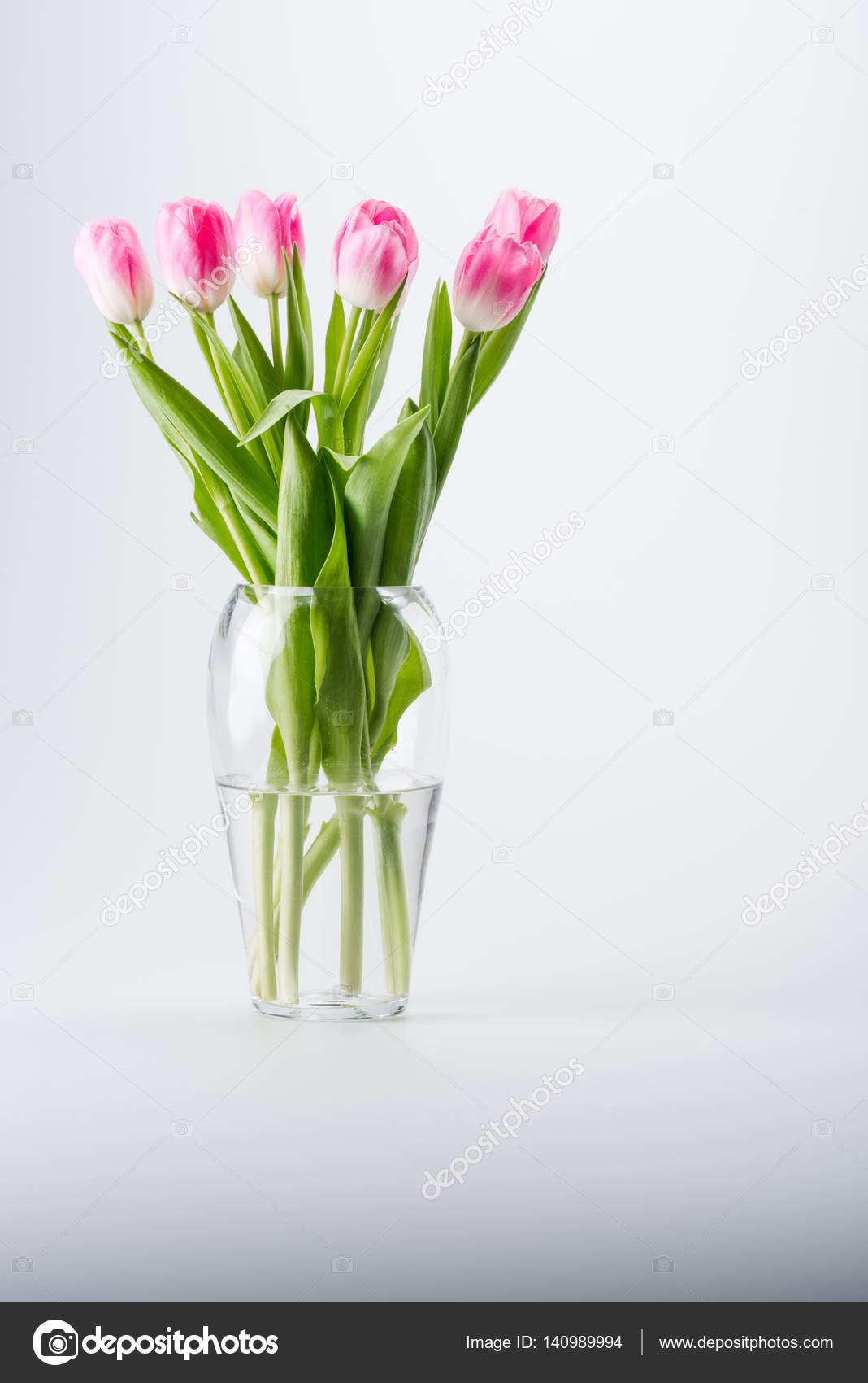Pink tulips in vase Stock Photo by ©AndrewBedrov 140989994
