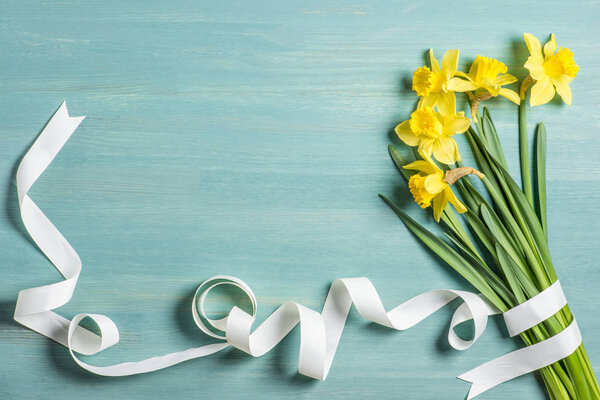 Yellow daffodils and ribbon