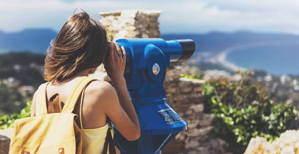 Hipster look observant binoculars telescope on panoramic view