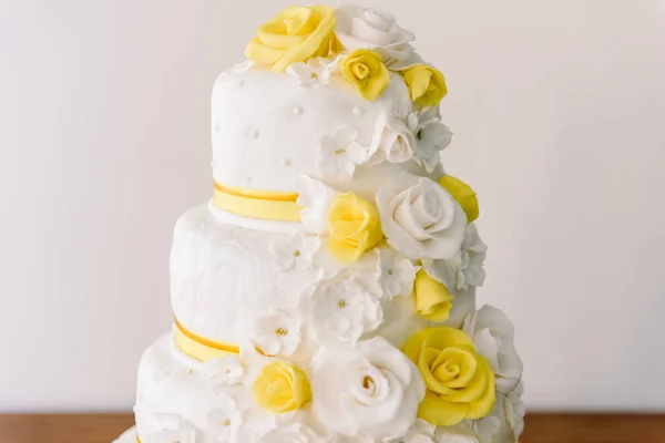 Wedding cake with yellow flowers, wedding cake