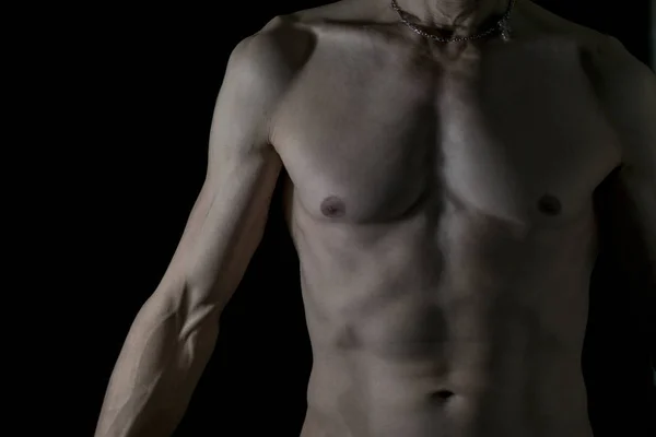 Ett fragment av en vuxen mans kropp. — Stockfoto